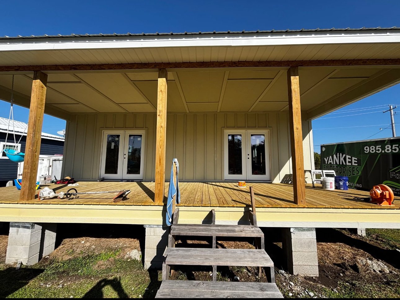Completed porch and siding South Louisiana